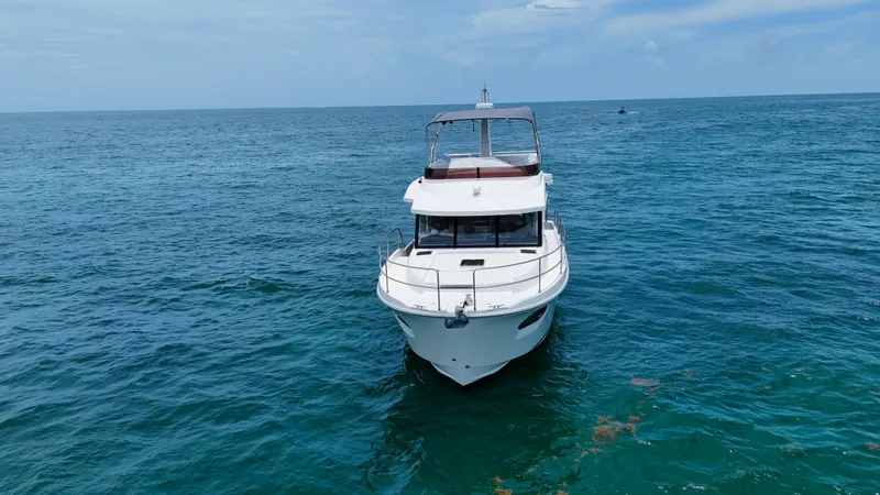  Yacht Photos Pics 2021 Beneteau Swift Trawler 41 Fly cruising on open sea.