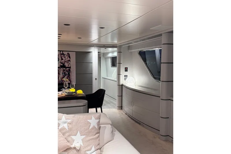  Yacht Photos Pics Luxurious interior of 2000 Sanlorenzo SL88 yacht with modern decor and elegant furnishings.