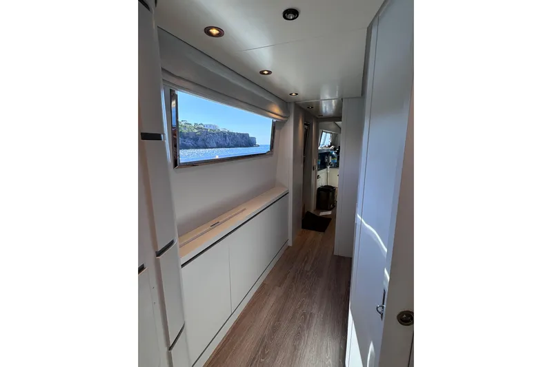  Yacht Photos Pics Interior hallway of 2000 Sanlorenzo SL88 yacht with modern design and ocean view.