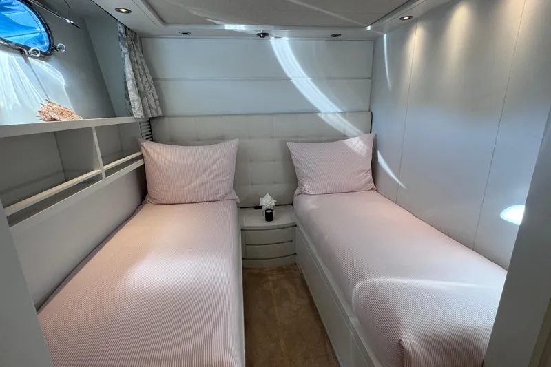  Yacht Photos Pics Twin cabin with pink bedding on Sanlorenzo SL88 yacht, 2000 model.