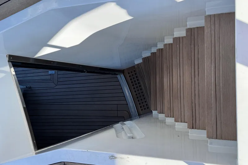  Yacht Photos Pics Staircase on Sanlorenzo SL88 yacht, 2000 model, with wooden steps and sleek design.