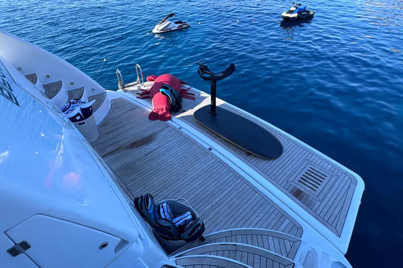  Yacht Photos Pics Luxurious Sanlorenzo SL88 yacht deck with water toys and jet skis, 2000 model.