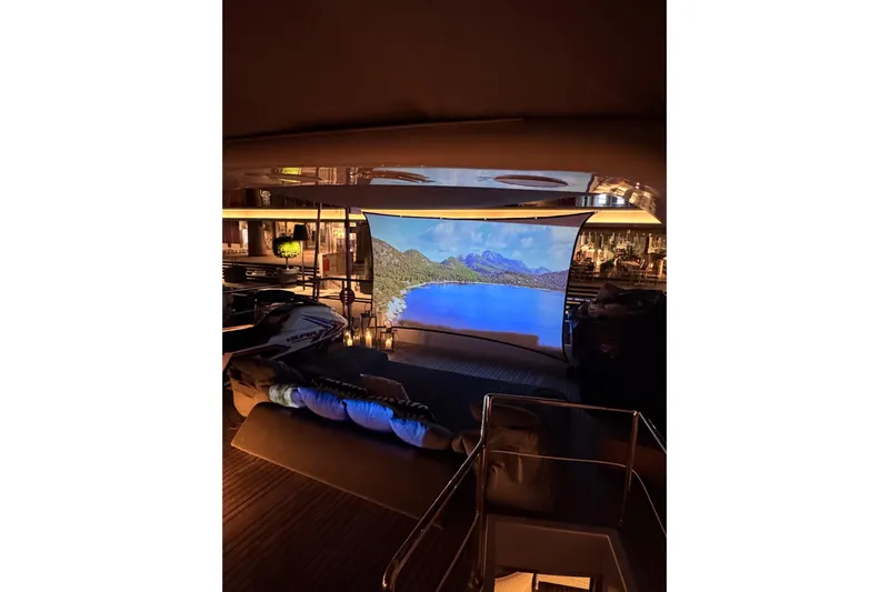  Yacht Photos Pics Luxurious Sanlorenzo SL88 yacht interior with large screen displaying scenic landscape.