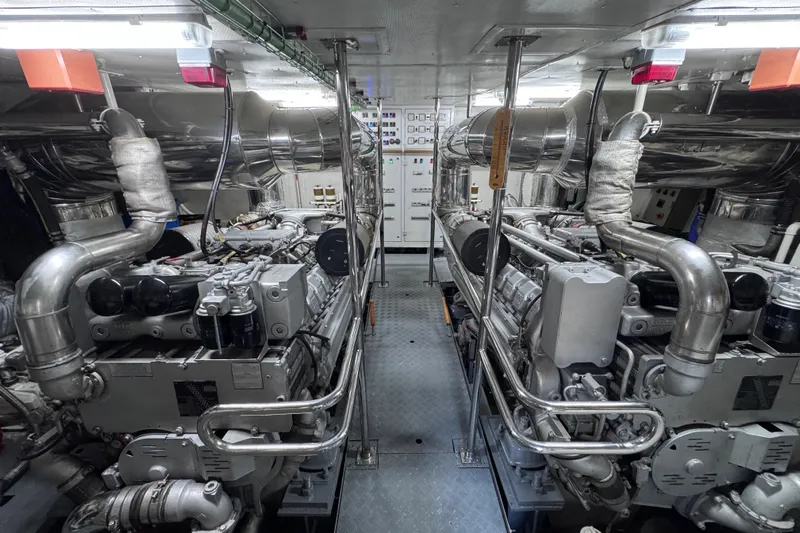  Yacht Photos Pics Engine room of 2000 Sanlorenzo SL88 yacht with dual engines and control panels.