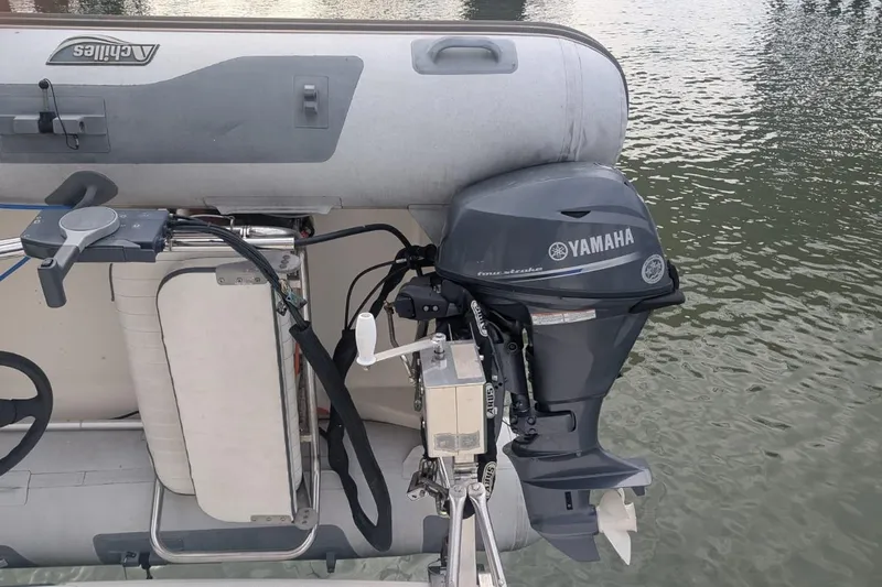 High Flyer Yacht Photos Pics Inflatable boat with Yamaha outboard motor, near water, 2007 Meridian 411 Sedan Bridge.