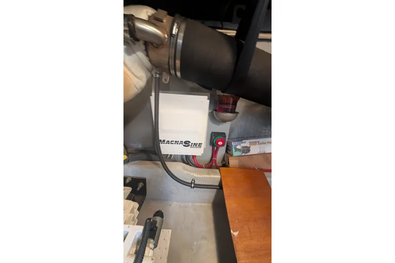 High Flyer Yacht Photos Pics Engine compartment of 2007 Meridian 411 Sedan Bridge with MagnaSine inverter.