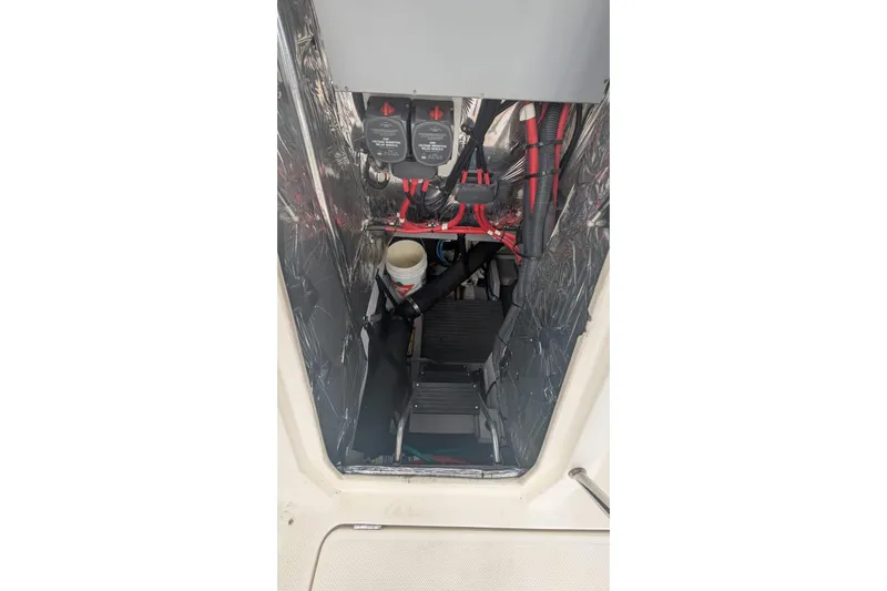 High Flyer Yacht Photos Pics Engine compartment of 2007 Meridian 411 Sedan Bridge with wiring and components.