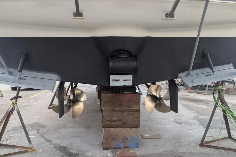 High Flyer Yacht Photos Pics 2007 Meridian 411 Sedan Bridge boat propellers and rudders on dry dock.