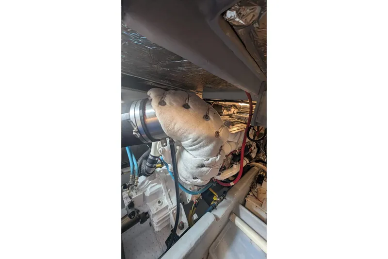 High Flyer Yacht Photos Pics Engine room of 2007 Meridian 411 Sedan Bridge with insulated exhaust system.