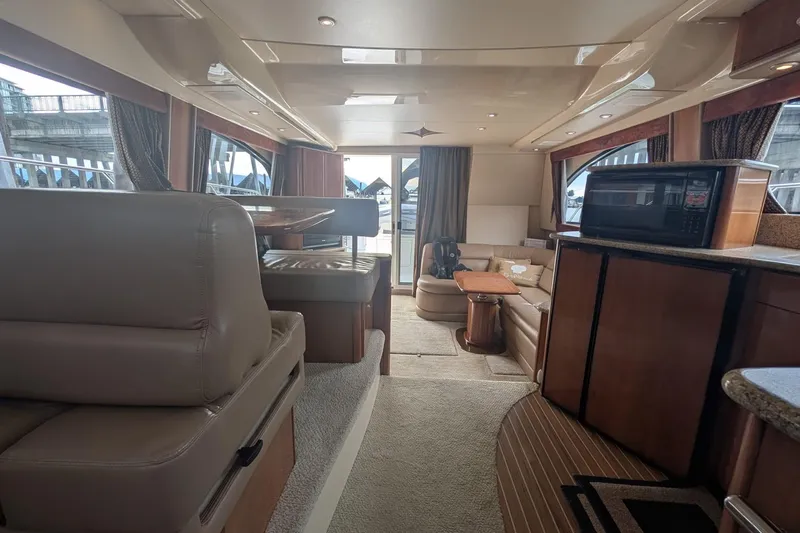 High Flyer Yacht Photos Pics Luxurious interior of 2007 Meridian 411 Sedan Bridge yacht with modern amenities.