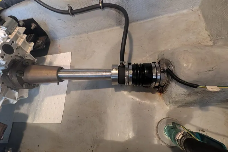 High Flyer Yacht Photos Pics Engine compartment of 2007 Meridian 411 Sedan Bridge, showing shaft and mechanical components.