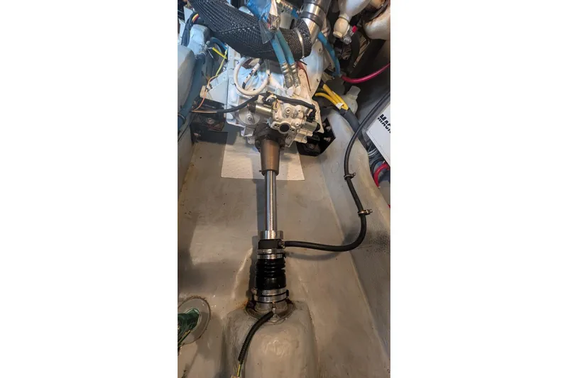 High Flyer Yacht Photos Pics Engine compartment of 2007 Meridian 411 Sedan Bridge, showing mechanical components and wiring.