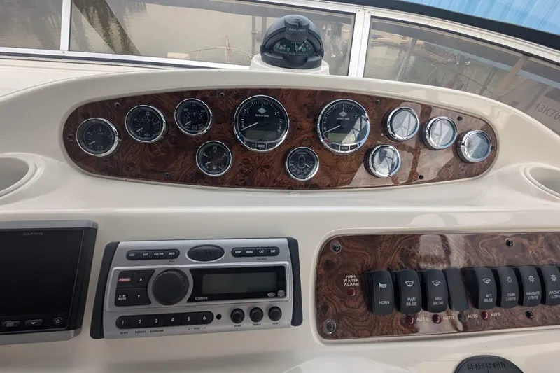 High Flyer Yacht Photos Pics Dashboard of a 2007 Meridian 411 Sedan Bridge with gauges and controls.