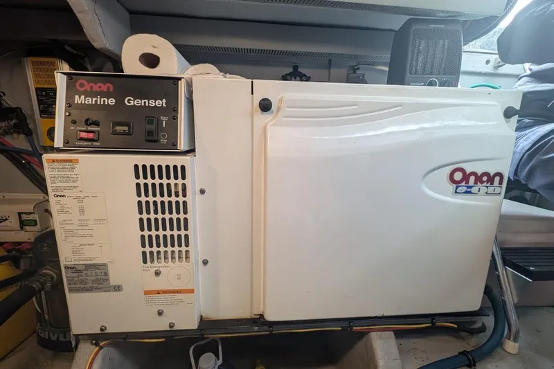 High Flyer Yacht Photos Pics Onan Marine Genset in 2007 Meridian 411 Sedan Bridge engine room.