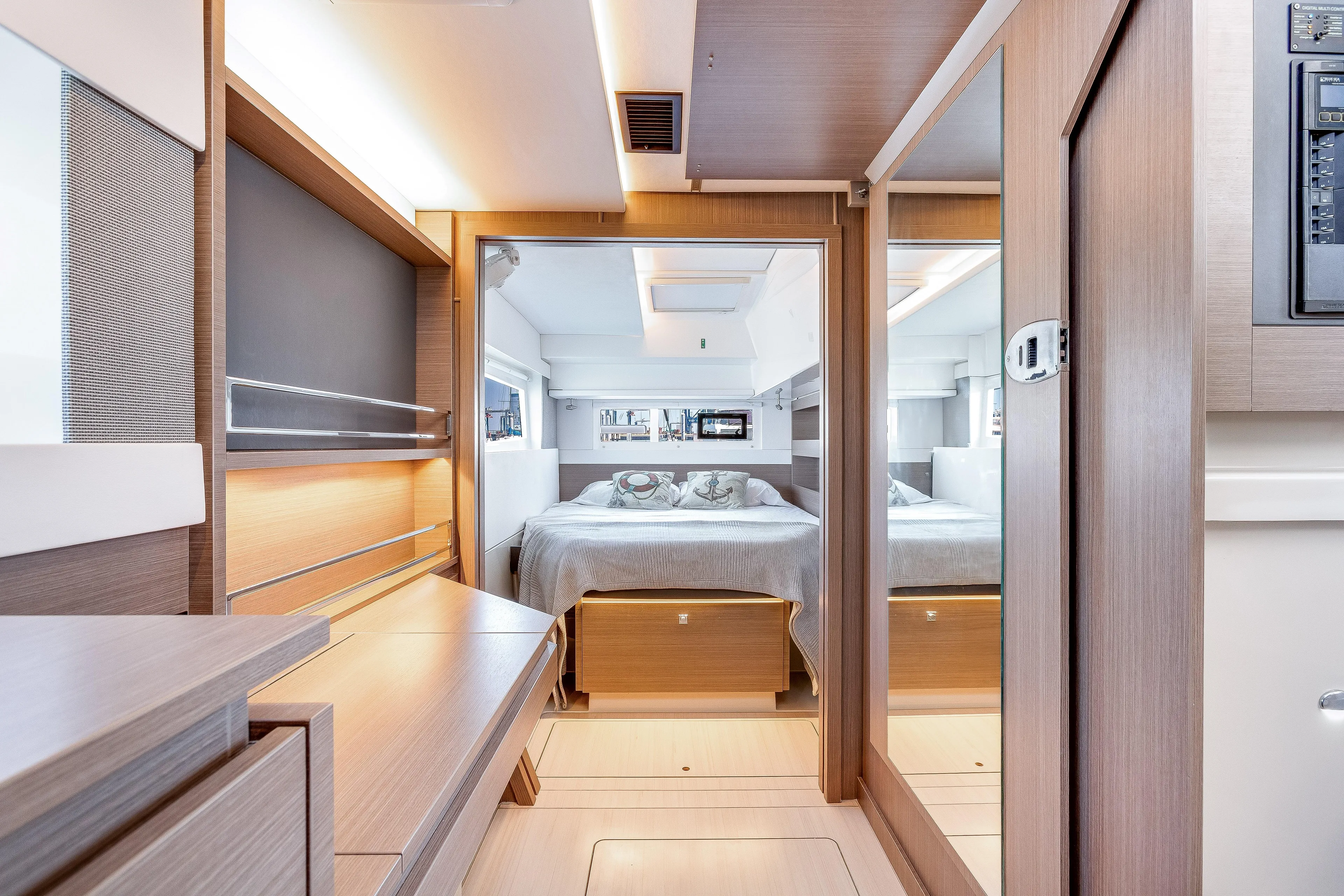 Limerick Yacht Photos Pics Luxurious interior of 2023 Leopard 42 yacht featuring a modern bedroom design.