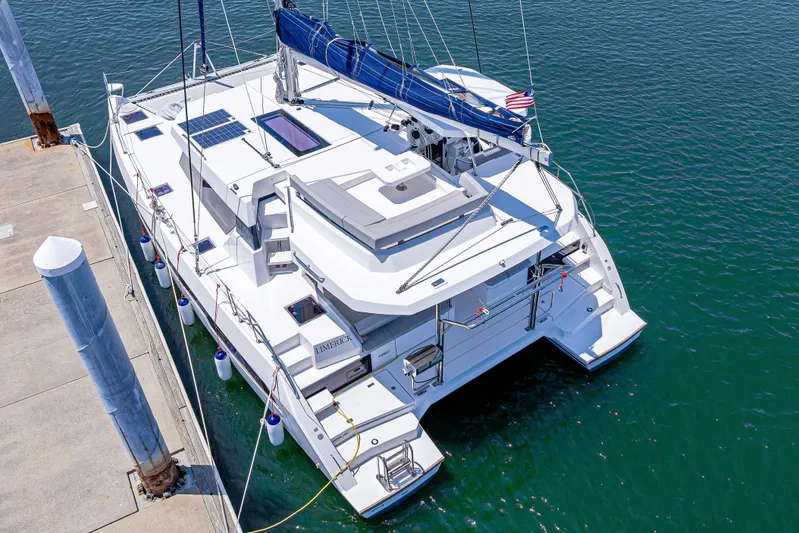Limerick Yacht Photos Pics 2023 Leopard 42 catamaran docked, featuring solar panels and sleek design.