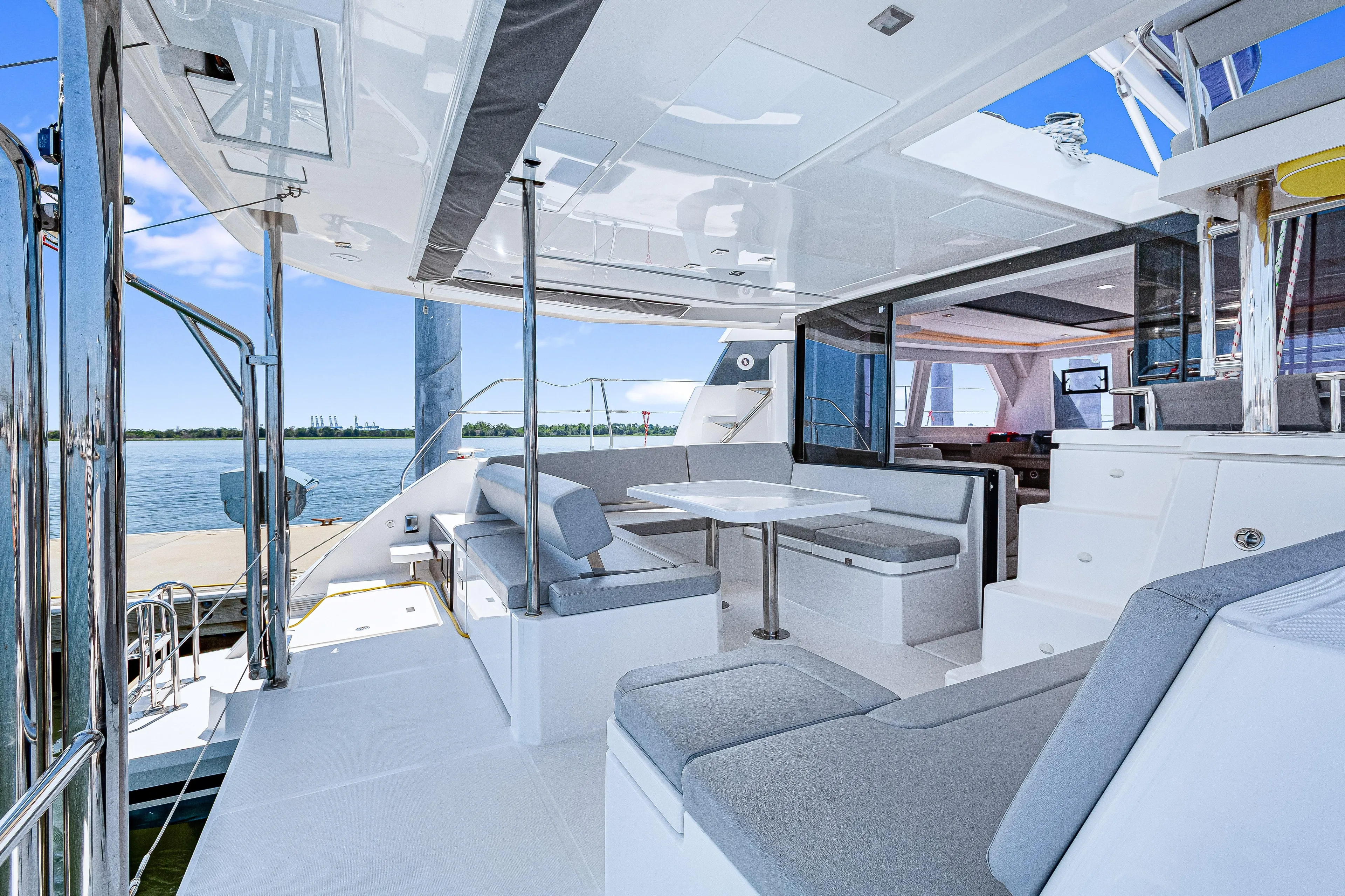 Limerick Yacht Photos Pics Luxurious 2023 Leopard 42 yacht interior with modern seating and dining area.