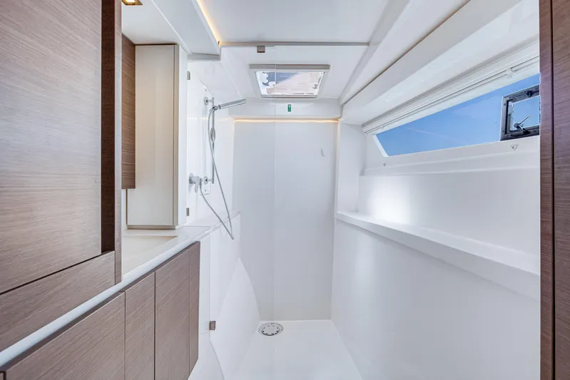 Limerick Yacht Photos Pics Modern bathroom interior on 2023 Leopard 42 yacht with sleek design and natural light.