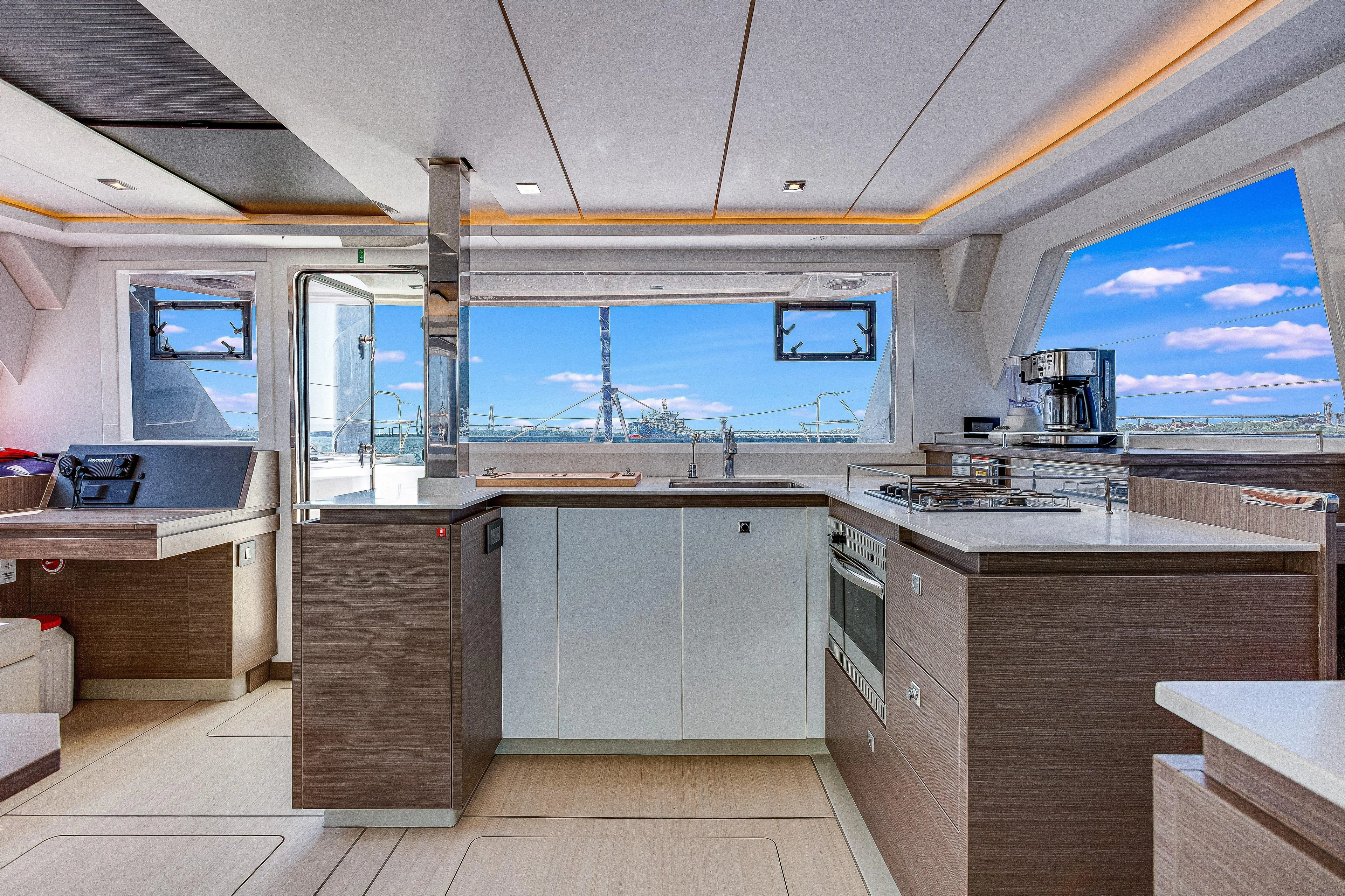 Limerick Yacht Photos Pics Modern kitchen interior of 2023 Leopard 42 yacht with ocean view.