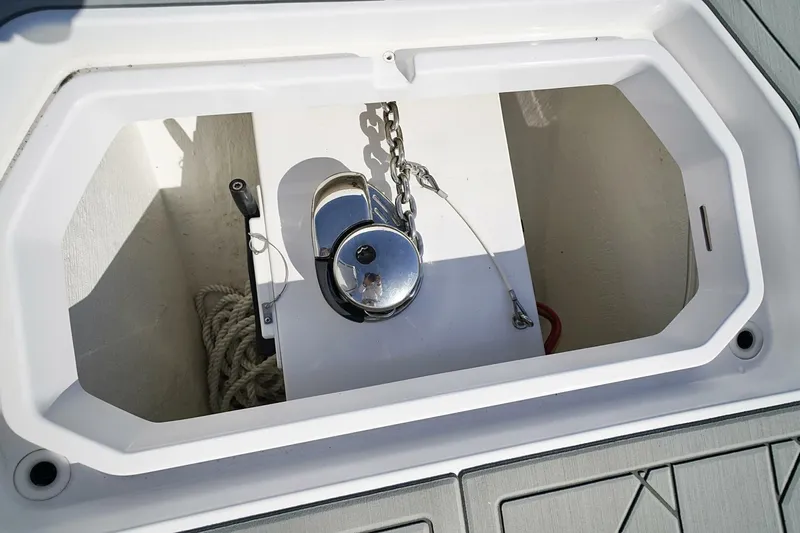 Little Lady Yacht Photos Pics Anchor compartment of 2024 Invincible 35 Catamaran with chain and winch.
