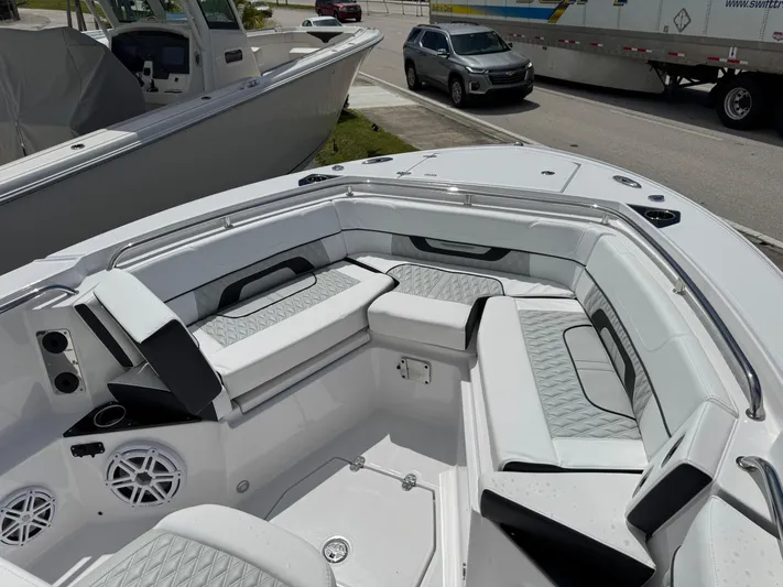 252 - 457 Yacht Photos Pics 2025 Blackfin 252 CC boat interior with luxurious seating and modern design.