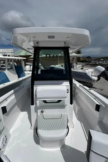 252 - 457 Yacht Photos Pics 2025 Blackfin 252 CC boat interior, featuring sleek design and modern seating.