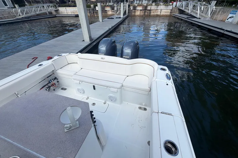  Yacht Photos Pics 2022 Sea Hunt Ultra 275 SE boat with dual engines docked at marina.
