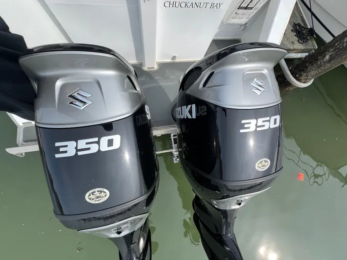  Yacht Photos Pics Twin Suzuki 350 outboard motors on a boat, Velocity LC3311, 2021 model.