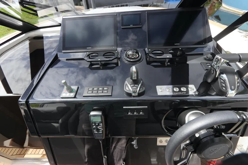  Yacht Photos Pics 2024 Astondoa 377 Coupe Outboard helm with modern navigation displays and controls.
