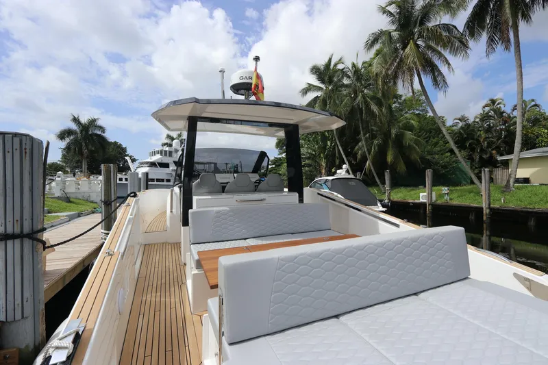  Yacht Photos Pics 2024 Astondoa 377 Coupe Outboard yacht with sleek deck and luxurious seating.