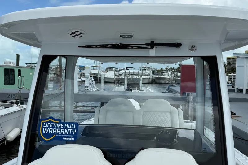  Yacht Photos Pics 2026 Everglades 315 Center Console boat with lifetime hull warranty at marina.