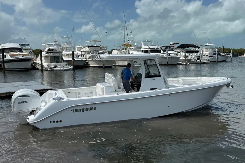  Yacht Photos Pics 2026 Everglades 315 Center Console boat docked in marina with Yamaha engine.