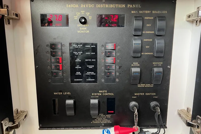  Yacht Photos Pics Control panel of a 1998 Sea Ray 540 Sundancer boat, showing battery and system switches.