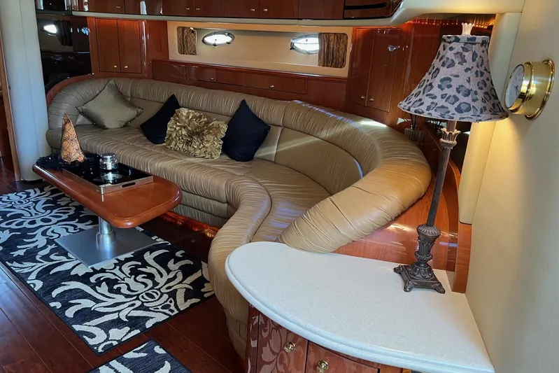  Yacht Photos Pics Luxurious interior of 1998 Sea Ray 540 Sundancer yacht with elegant seating and decor.