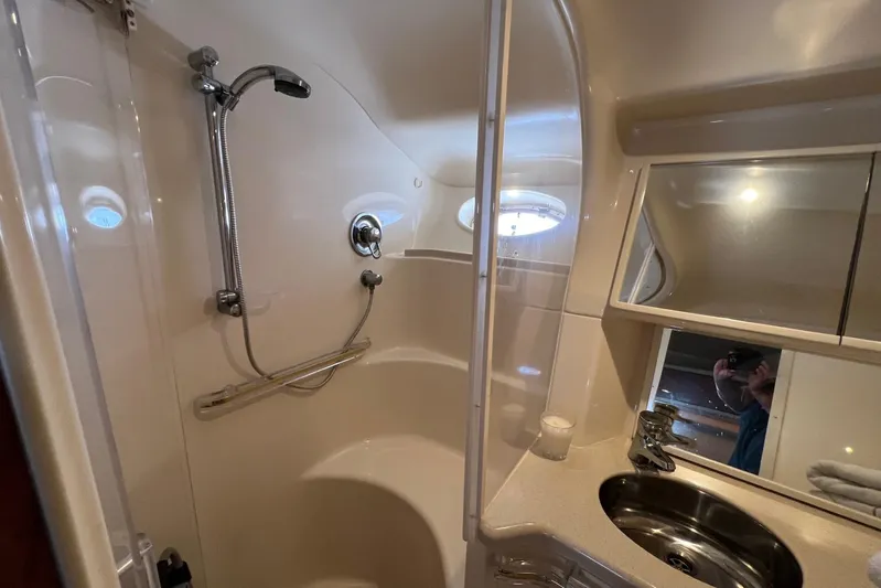  Yacht Photos Pics Bathroom interior of 1998 Sea Ray 540 Sundancer yacht with shower and sink.