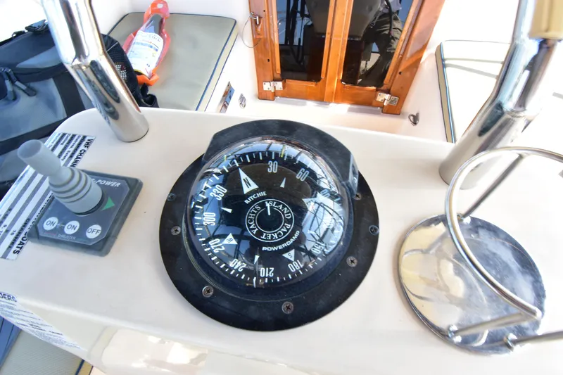 Chinook Yacht Photos Pics Compass and controls on 2004 Island Packet 485 yacht deck.