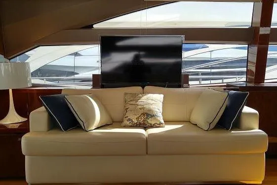 Yacht Photos Pics Luxurious interior of 2014 Princess 72 yacht with elegant sofa and cushions.