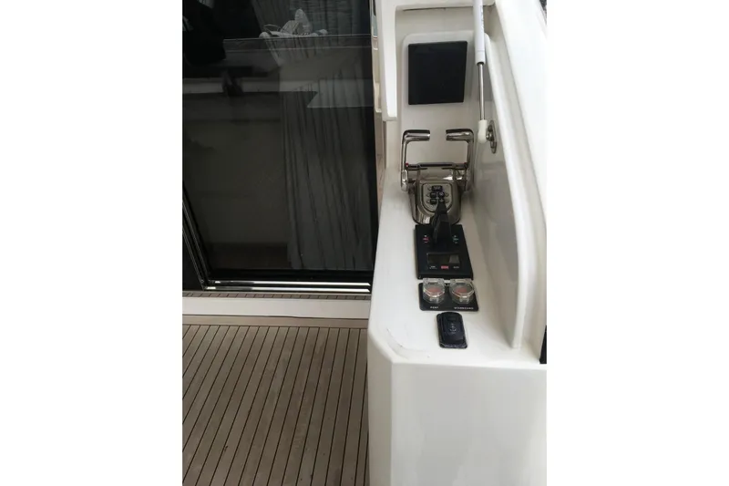  Yacht Photos Pics Control panel on a 2014 Princess 72 yacht, featuring sleek design and modern controls.