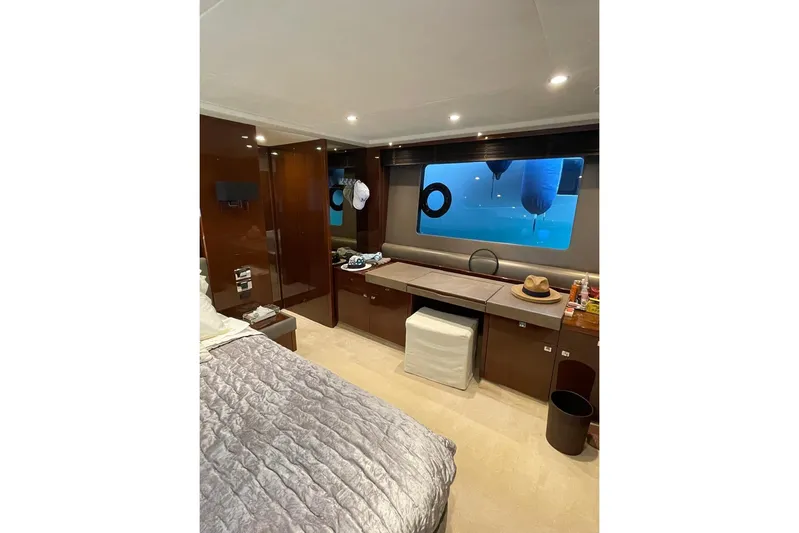  Yacht Photos Pics Luxurious interior of 2014 Princess 72 yacht with elegant furnishings and large window view.