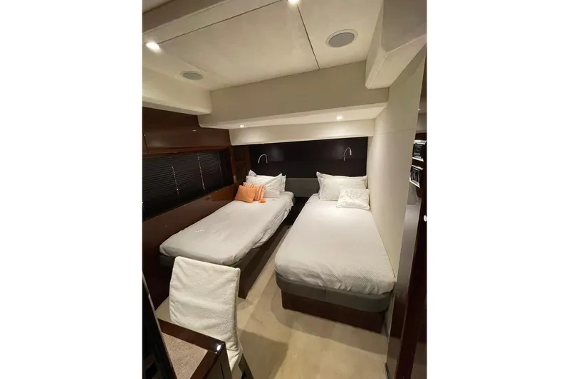  Yacht Photos Pics Luxurious cabin interior of 2014 Princess 72 yacht with twin beds and modern decor.