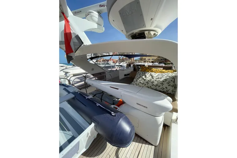  Yacht Photos Pics Luxurious 2014 Princess 72 yacht deck with seating and inflatable boat.