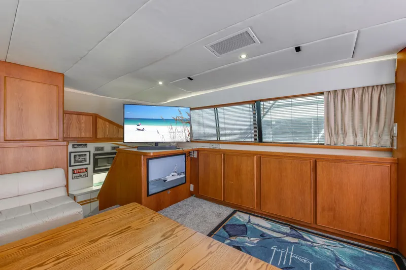 Yacht Photos Pics Interior of 1990 Bertram 50 Convertible yacht with wood paneling and modern amenities.