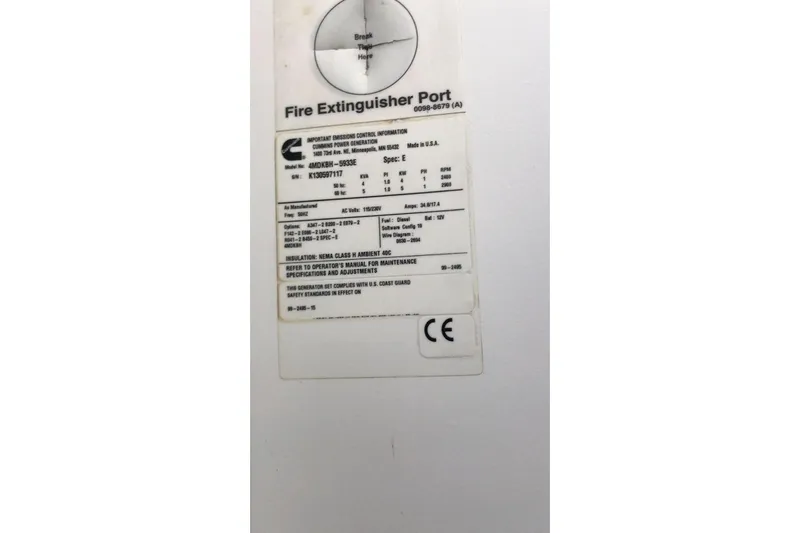 Sea Jade Yacht Photos Pics Label on Fontaine Pajot 63, 2014 model, featuring fire extinguisher port and specifications.