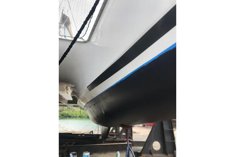 Sea Jade Yacht Photos Pics Close-up of 2014 FONTAINE PAJOT 63 catamaran hull in dry dock.