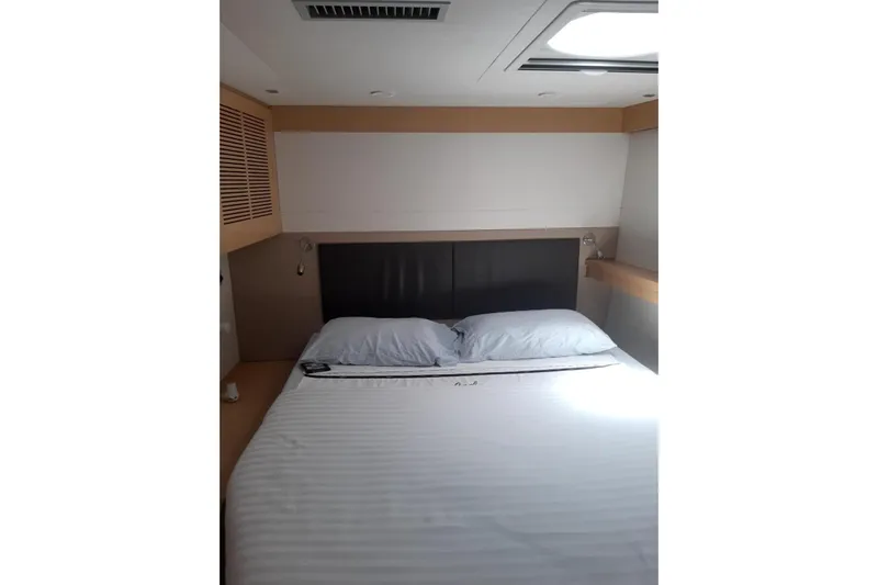 Sea Jade Yacht Photos Pics Luxurious bedroom interior of 2014 FONTAINE PAJOT 63 yacht with modern design.