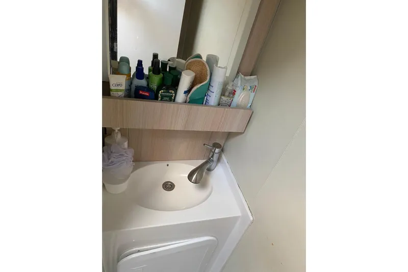 Sea Jade Yacht Photos Pics Bathroom sink area with toiletries on a 2014 FONTAINE PAJOT 63 yacht.