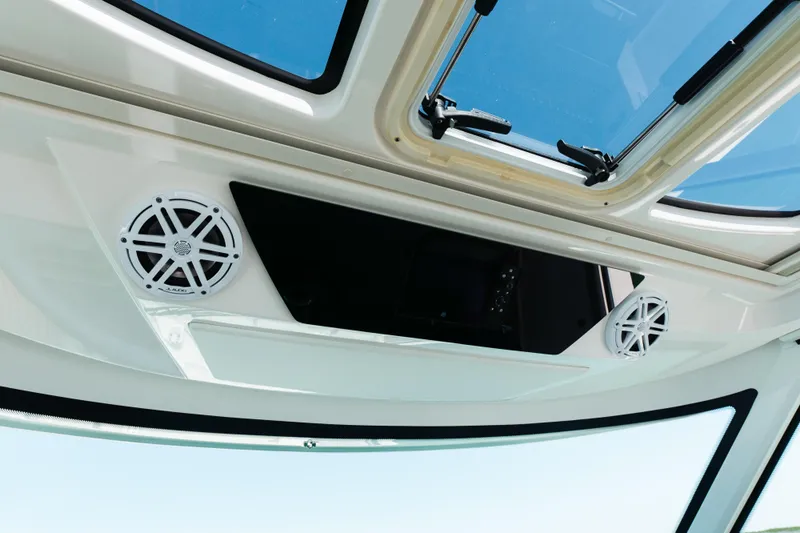 Phoenix Yacht Photos Pics 2023 Tiara 48 boat interior with speakers and sunroof.