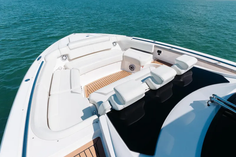 Phoenix Yacht Photos Pics Luxurious 2023 Tiara 48 yacht with spacious seating on open water.