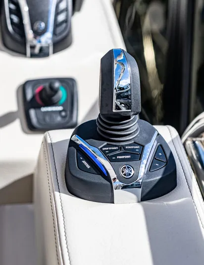 Syren Yacht Photos Pics Close-up of 2022 Regal 42 FXO boat control joystick.