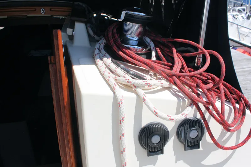 Tigerlily Yacht Photos Pics Sailboat deck with winch and ropes on a 2004 Pacific Seacraft 31.